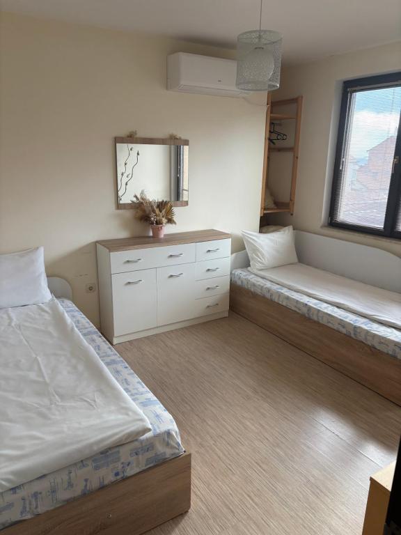 Postel nebo postele na pokoji v ubytování Apartament Emi