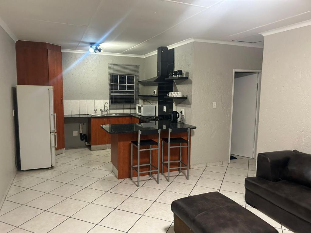 Η κουζίνα ή μικρή κουζίνα στο 16 Maz suite