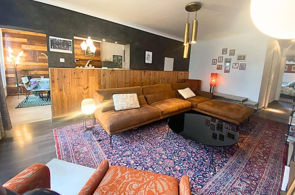 Χώρος καθιστικού στο Le Passage des Décorateurs T3 Spacieux et central