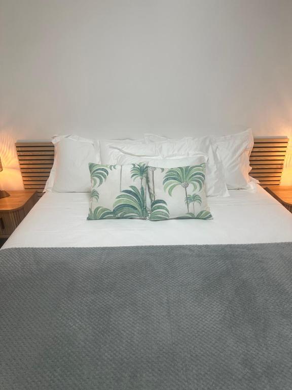 Ένα ή περισσότερα κρεβάτια σε δωμάτιο στο Nanua Lodge 1 green