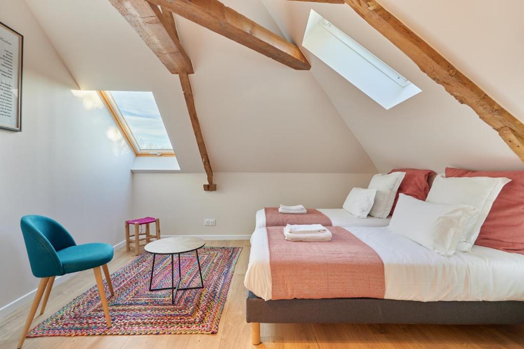 Postel nebo postele na pokoji v ubytování Le Cottage du Bessin - Proximité historique - Bayeux