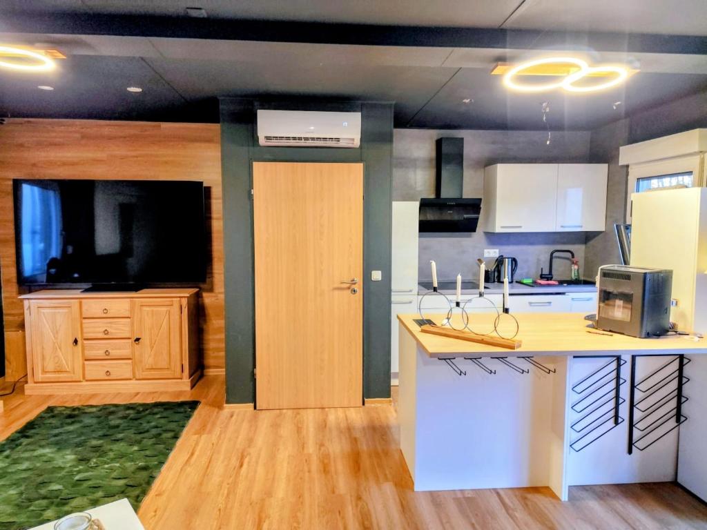 Kuchyň nebo kuchyňský kout v ubytování Tiny House