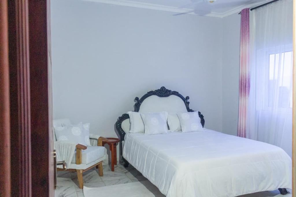 En eller flere senge i et værelse på The cozy lookout