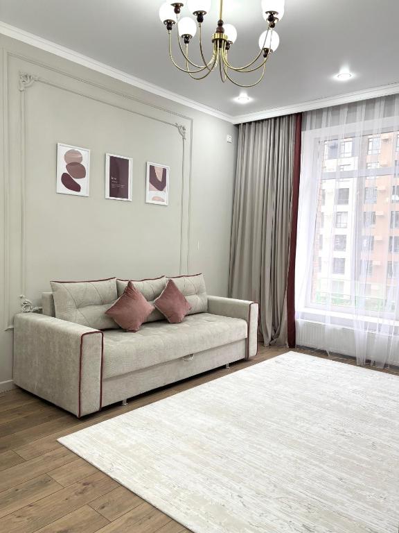 Istumisnurk majutusasutuses Современная и уютная евродвушка в районе Хан Шатыра