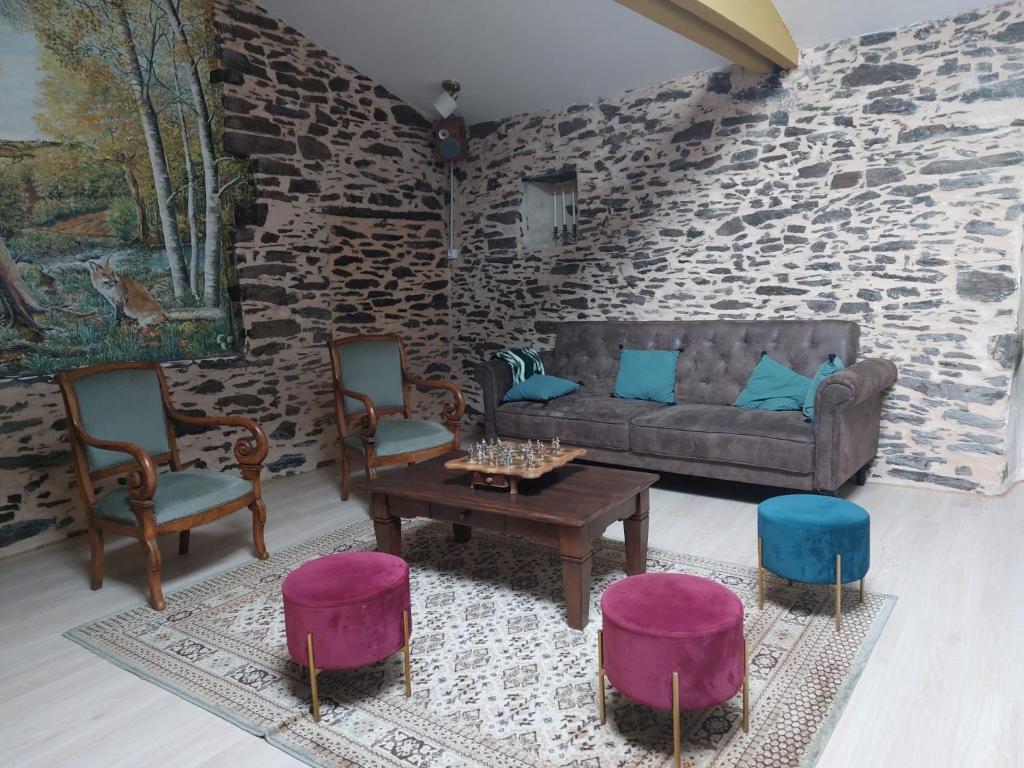 Posezení v ubytování La Tanière du Renard