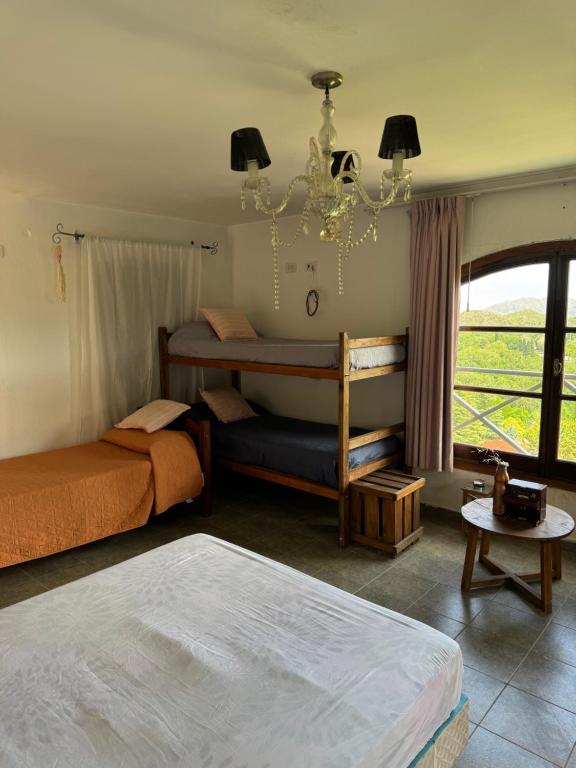 Postel nebo postele na pokoji v ubytování Hostal La Vie est Belle