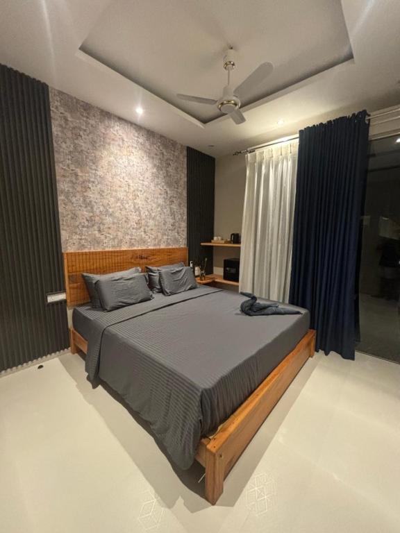 Postel nebo postele na pokoji v ubytování Hello Weligama