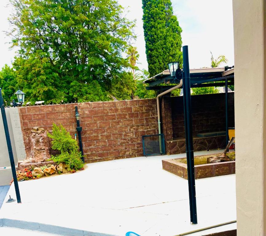 Zahrada ubytování QHAWEKAZI GUEST HOUSe