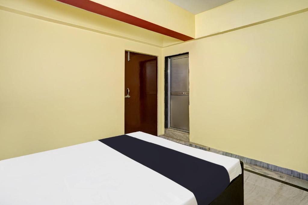 Ένα ή περισσότερα κρεβάτια σε δωμάτιο στο Super Hotel O DEGREE HOTEL