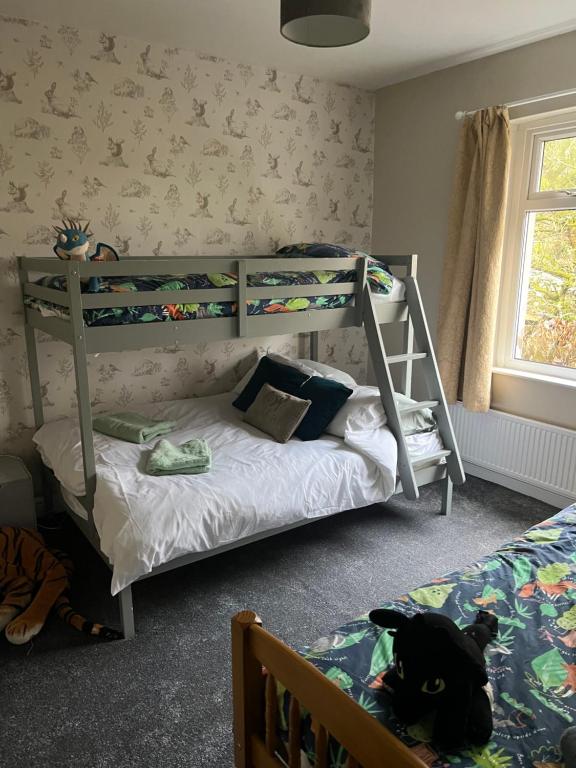 Postel nebo postele na pokoji v ubytování The Holm