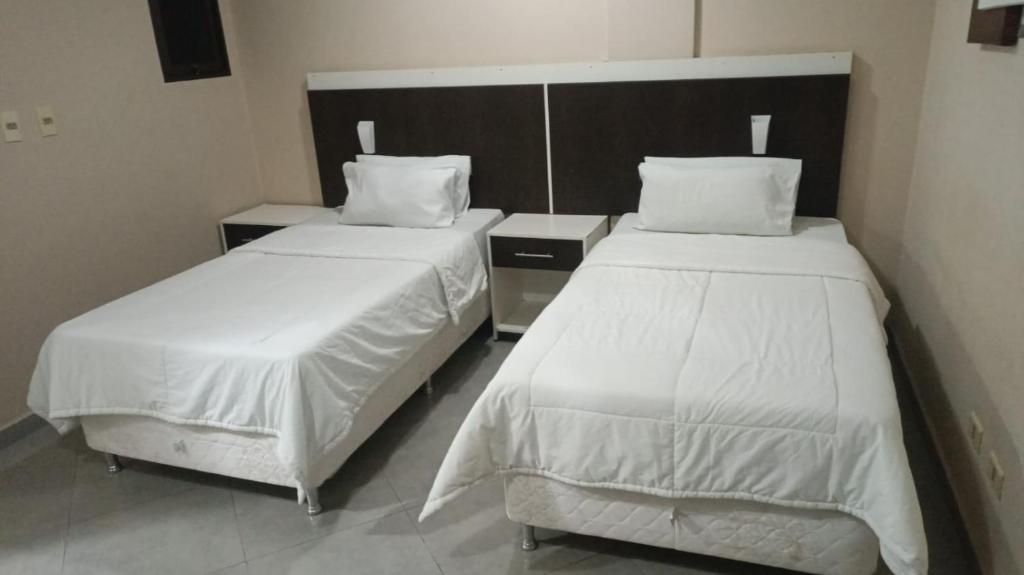 En eller flere senge i et værelse på Del este