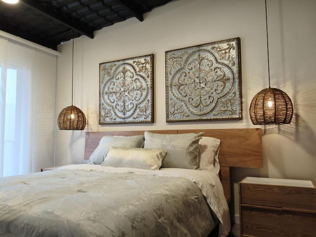 Postel nebo postele na pokoji v ubytování Rio Blanco Eco Lodge - Cloud Forest Birding