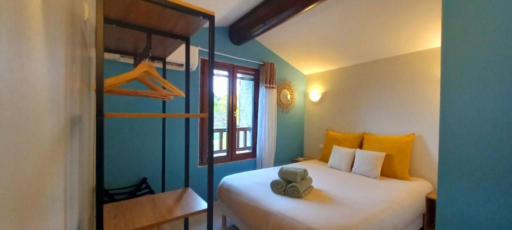 Postel nebo postele na pokoji v ubytování Le Cabanon d'Andréa