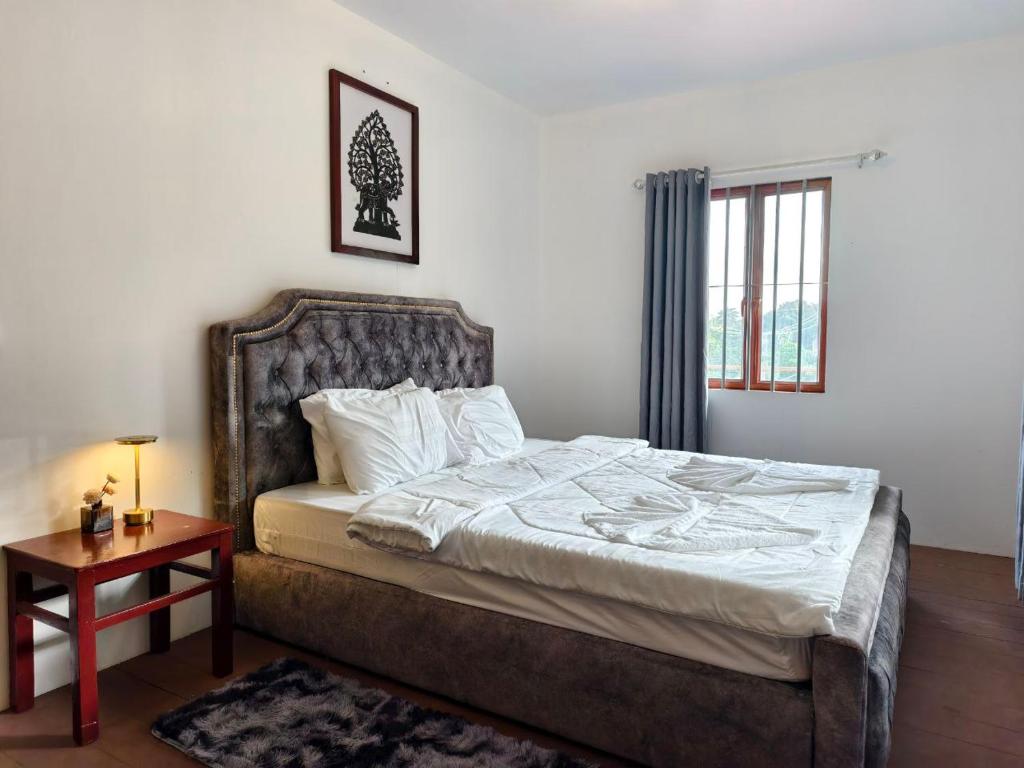 Ένα ή περισσότερα κρεβάτια σε δωμάτιο στο Reaksa Private Villa - Koh Rong