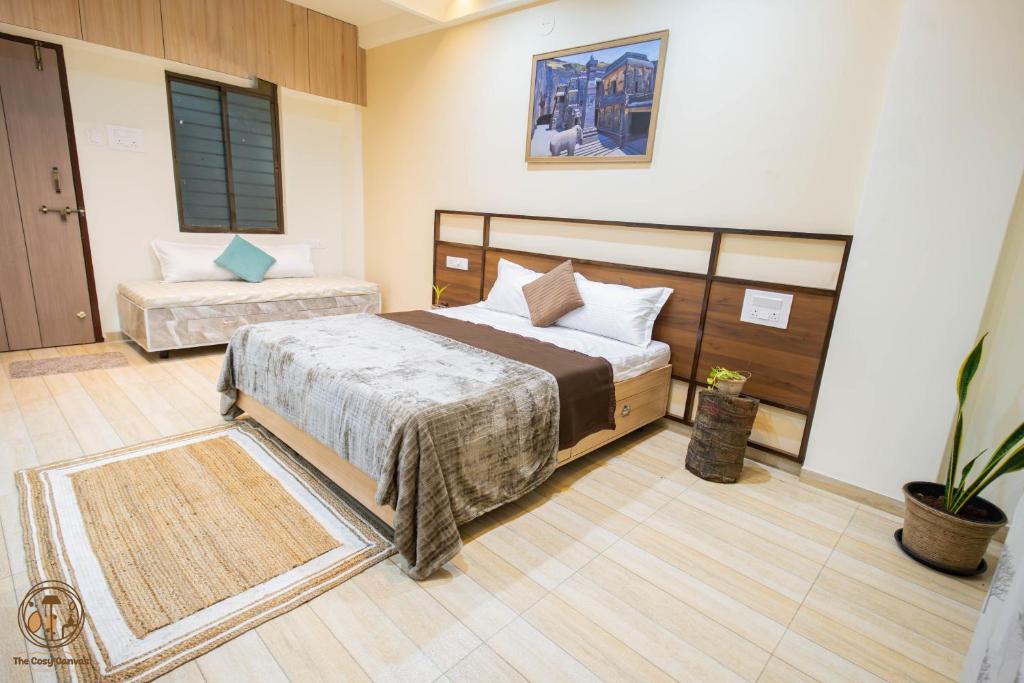 Ένα ή περισσότερα κρεβάτια σε δωμάτιο στο Desai Home Stay