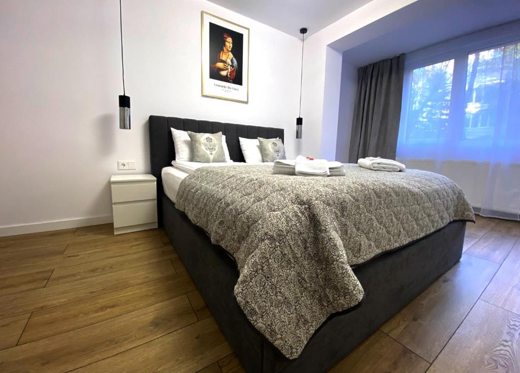 Postel nebo postele na pokoji v ubytování DaVinci Apartment with Self Check-In