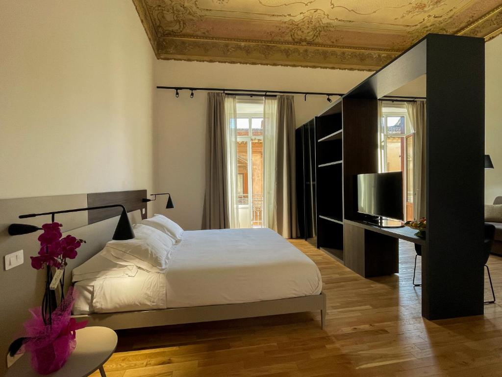 Ένα ή περισσότερα κρεβάτια σε δωμάτιο στο Tambasia