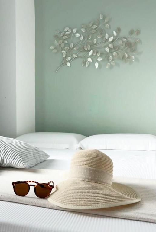 Ένα ή περισσότερα κρεβάτια σε δωμάτιο στο NORA Apartment 1