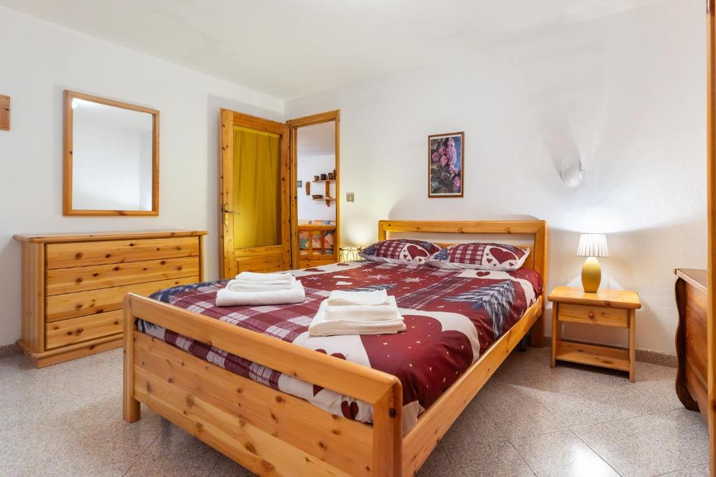 Voodi või voodid majutusasutuse Chalet Mazod, a 5 minuti dagli impianti di sci - Free Wifi toas