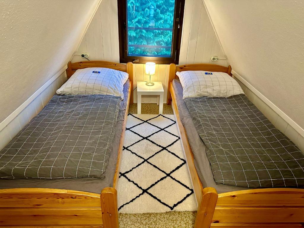 Voodi või voodid majutusasutuse Finnhütte Louise am Storkower See toas