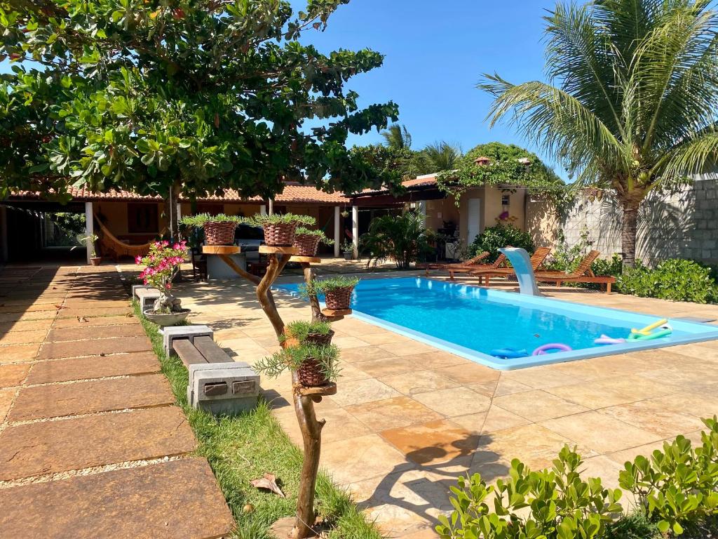 Bazén v ubytování Casa com Piscina Privativa - Perto da Lagoa do Paraíso nebo v jeho okolí