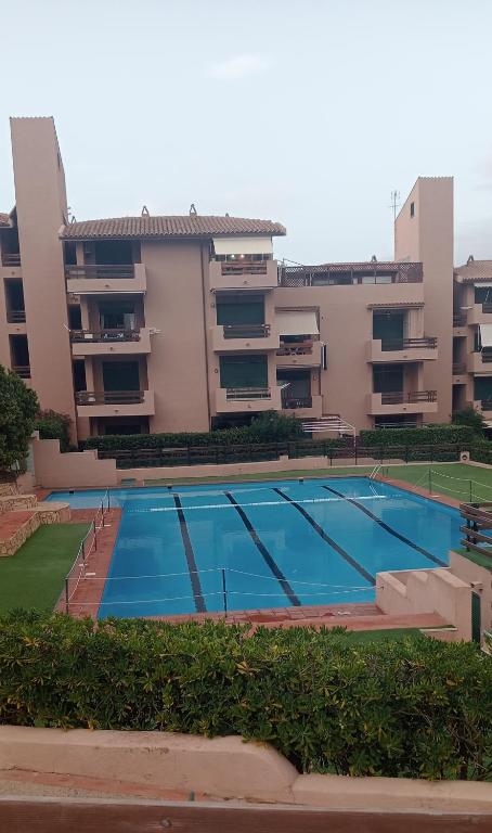 Swimmingpoolen hos eller tæt på Appartamento a La Maddalena