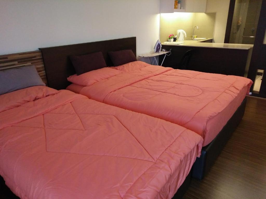 Postel nebo postele na pokoji v ubytování Best Studio Guest House