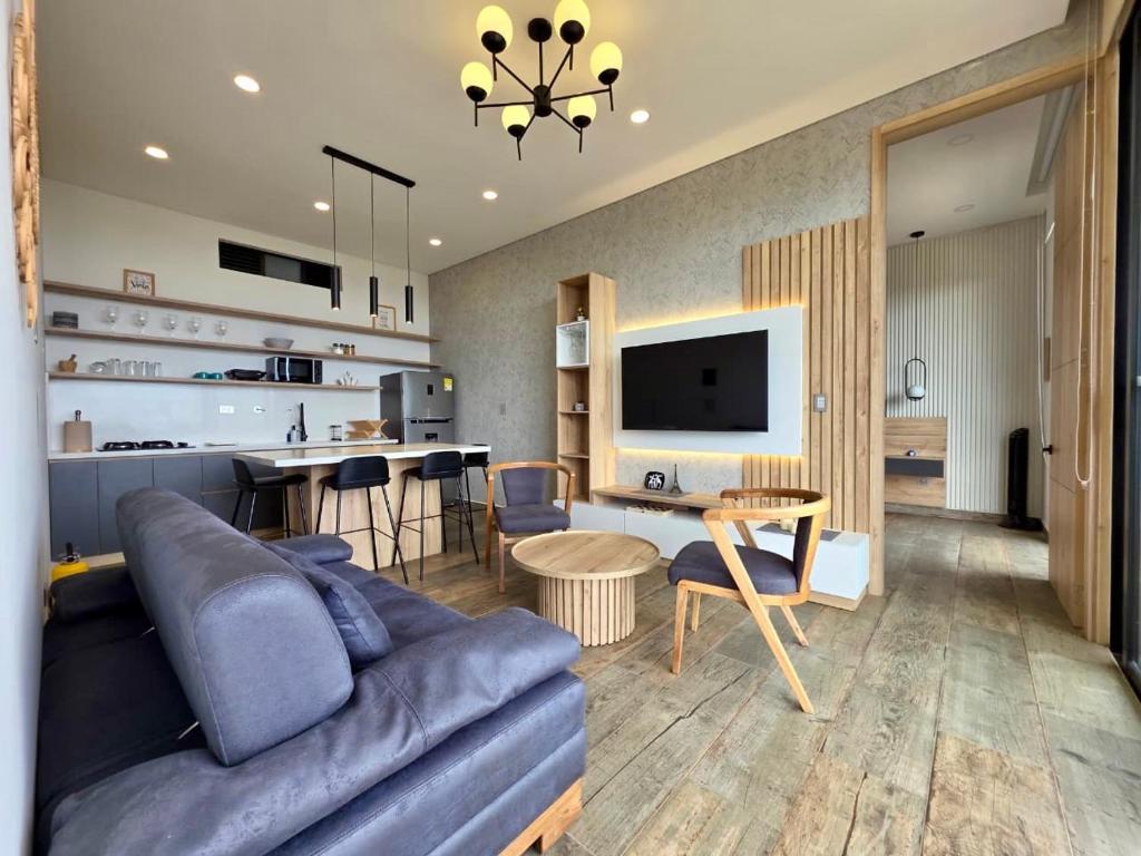 Μια τηλεόραση ή/και κέντρο ψυχαγωγίας στο Montecielo Lodge 41 - Jacuzzi y Vista Piedra Peñol