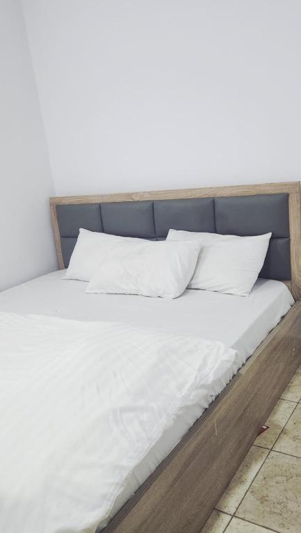 Ένα ή περισσότερα κρεβάτια σε δωμάτιο στο Dominion Apartment and Guest House