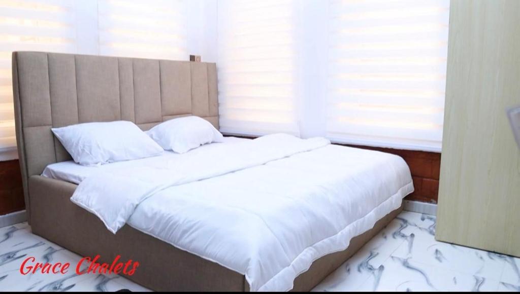 Voodi või voodid majutusasutuse Grace Chalets toas