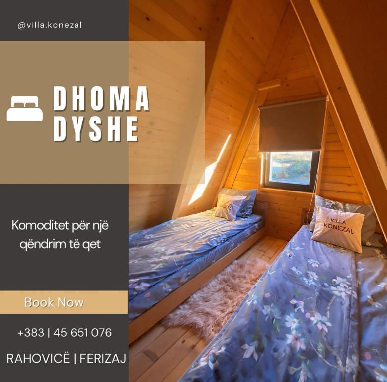 Un pat sau paturi într-o cameră la Villa Konezal