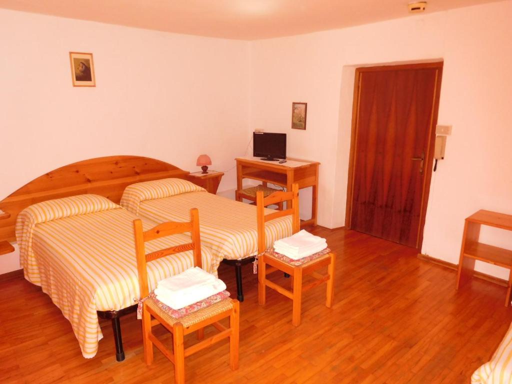 TV a/nebo společenská místnost v ubytování Antico Albergo Sant'Antonio