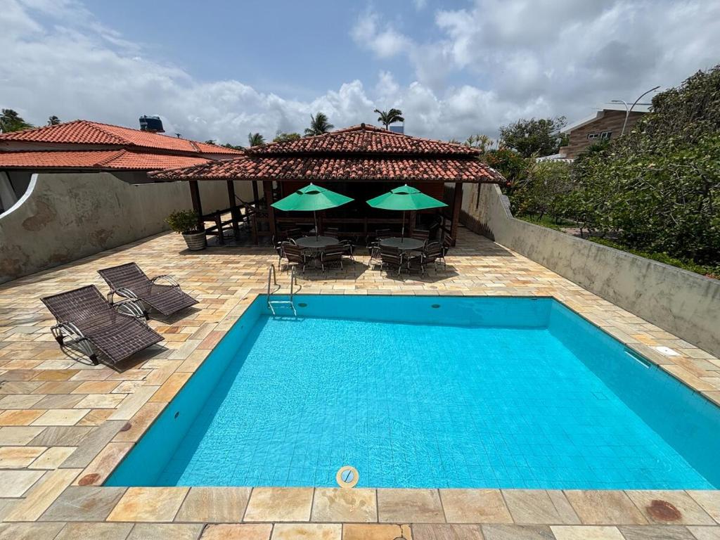 Swimmingpoolen hos eller tæt på Casa Beira Mar