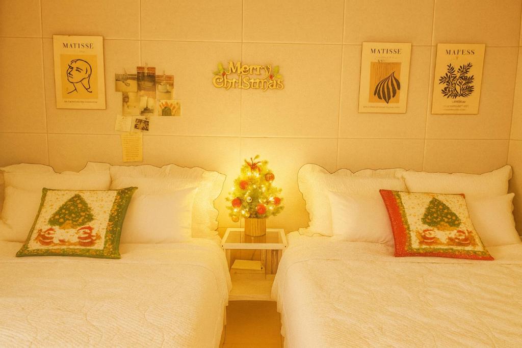 Postel nebo postele na pokoji v ubytování Stay Seoul Stay