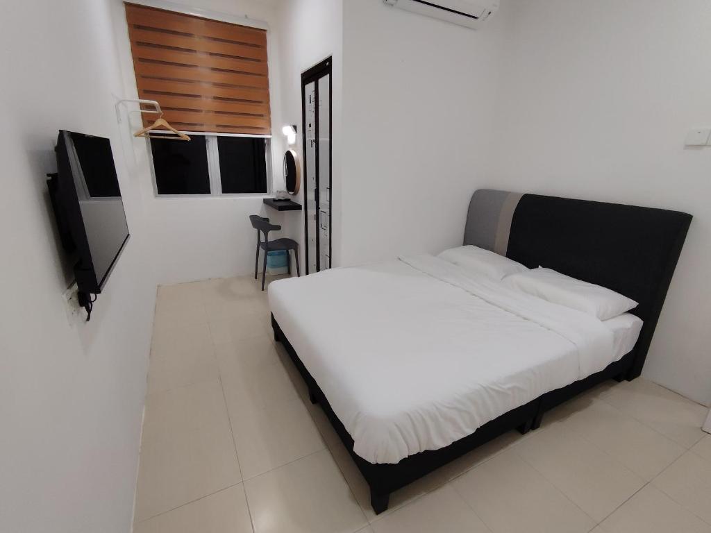 Μια τηλεόραση ή/και κέντρο ψυχαγωγίας στο YNY Guest House