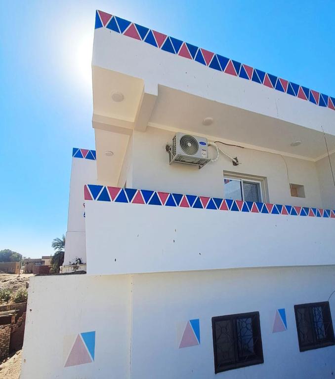 a camera on the side of a building at nubian yellow desert in Aswan