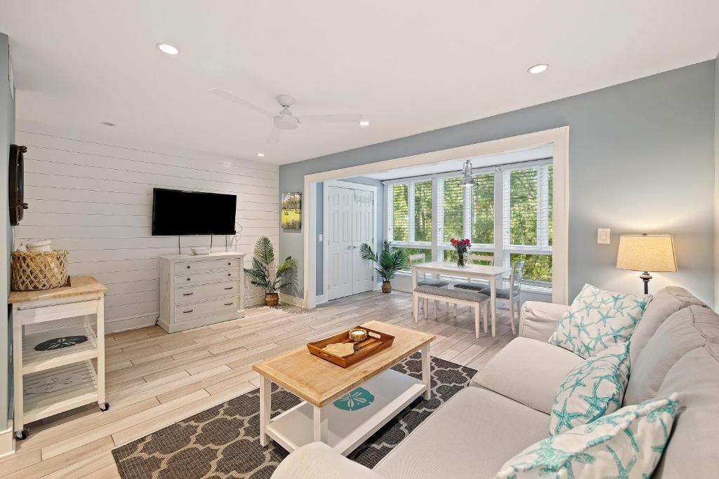 a living room with a couch and a table at SS3524: 3524 Seascape in Kiawah Island