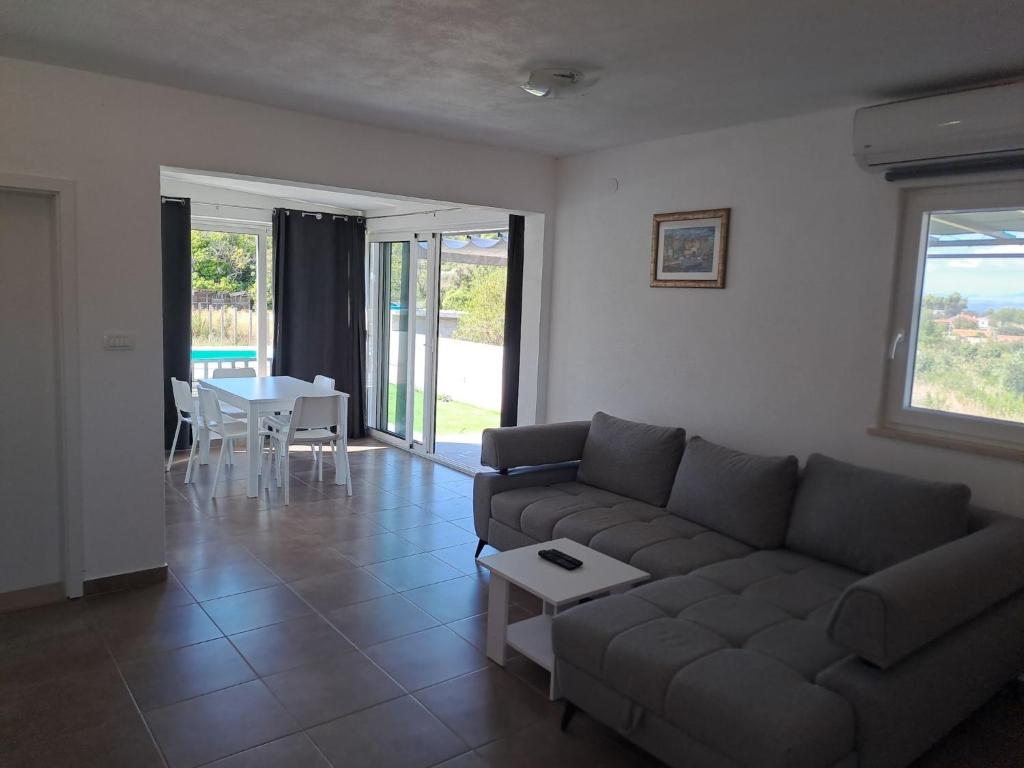 Posezení v ubytování Nane Garden house with heat pool