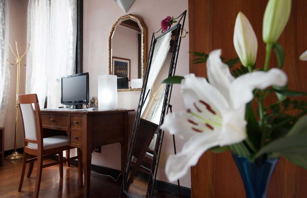 TV a/nebo společenská místnost v ubytování Hotel Al Castello