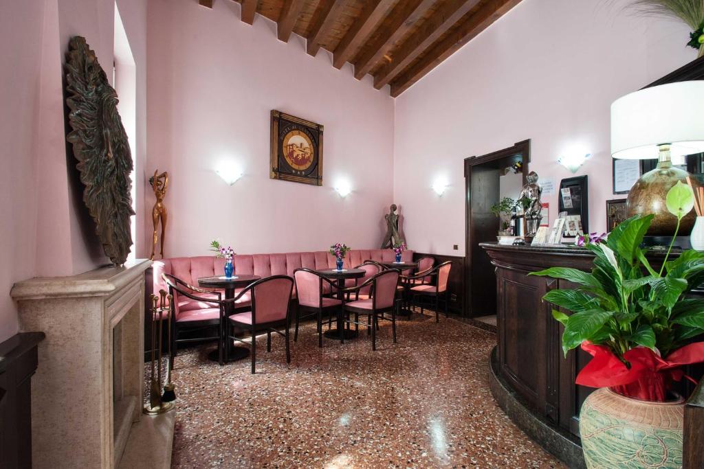 Posezení v ubytování Hotel Al Castello