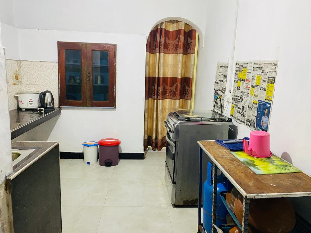 O bucătărie sau chicinetă la Heart Whispering