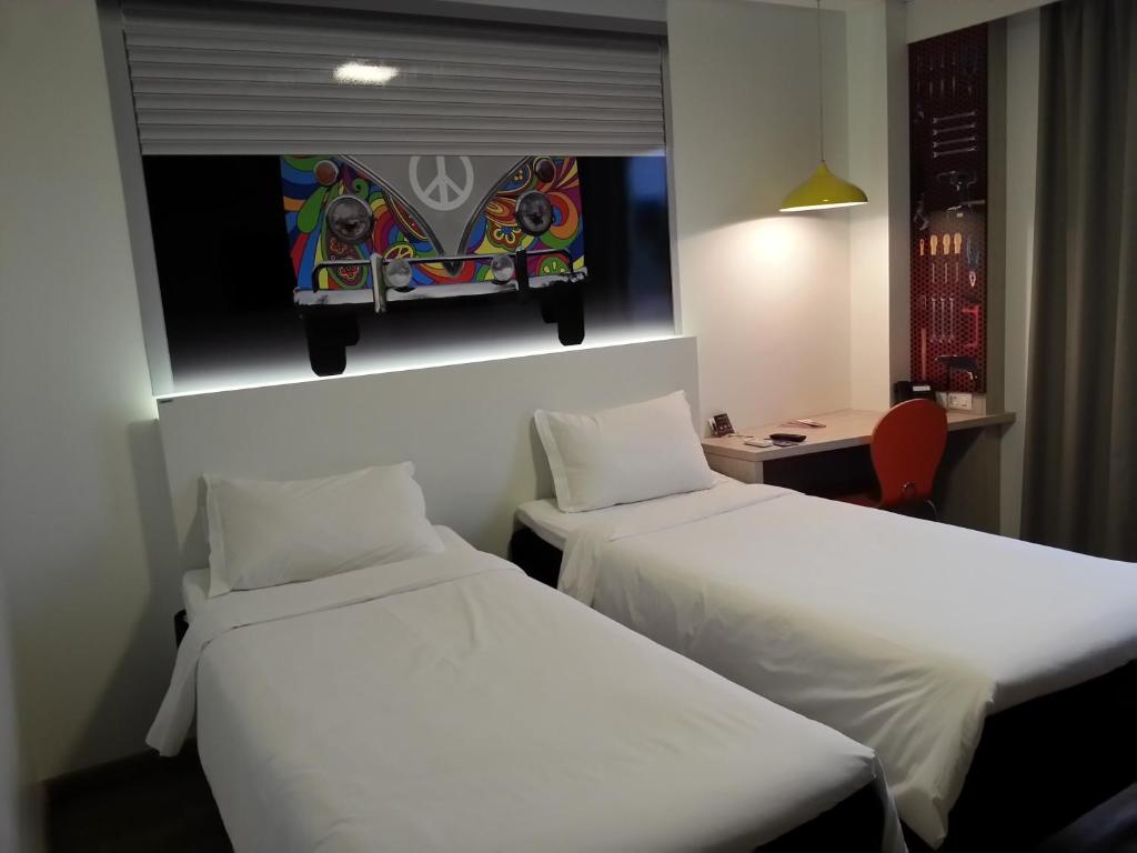 Postel nebo postele na pokoji v ubytování Hotel Caiuá Lago Umuarama