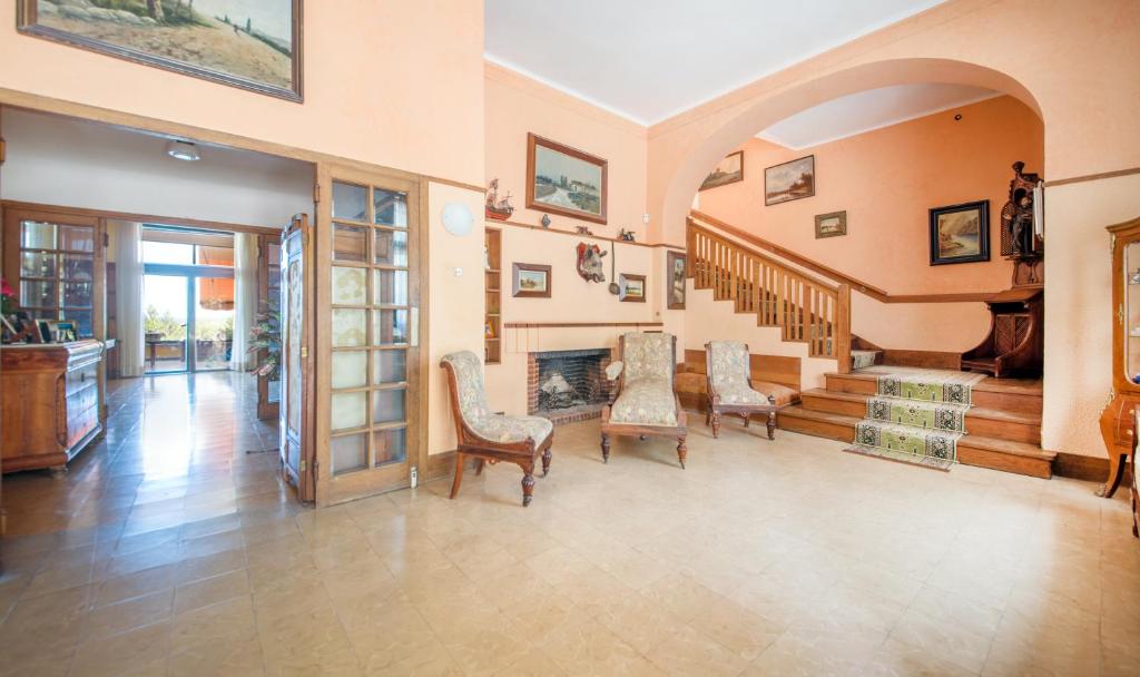 Posedenie v ubytovaní Habitaciones Villa Marcia Solo Adulto