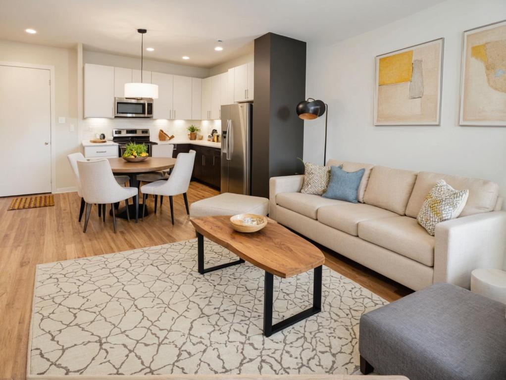 a living room with a couch and a table at Art District Downtown Spacious Homes in Los Angeles