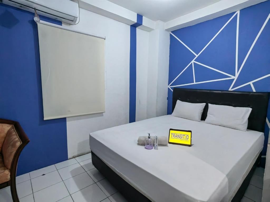 Postel nebo postele na pokoji v ubytování Transit ID