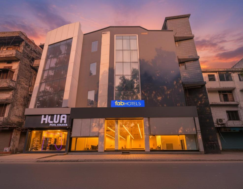 a store front of a building with a sunset at Via Urban Residency in New Delhi