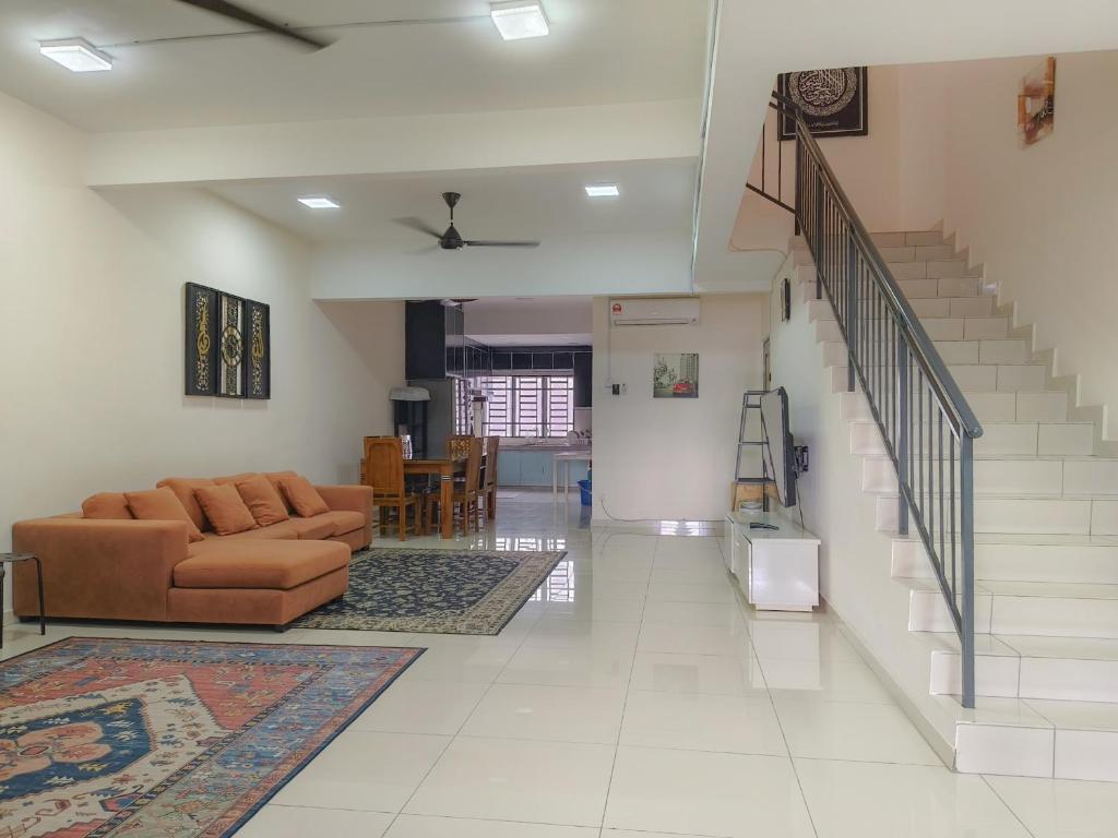 Χώρος καθιστικού στο Homestay Beruntung Adenium