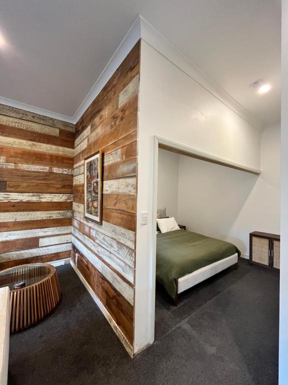 Ένα ή περισσότερα κρεβάτια σε δωμάτιο στο The Nook And Cranny Greytown