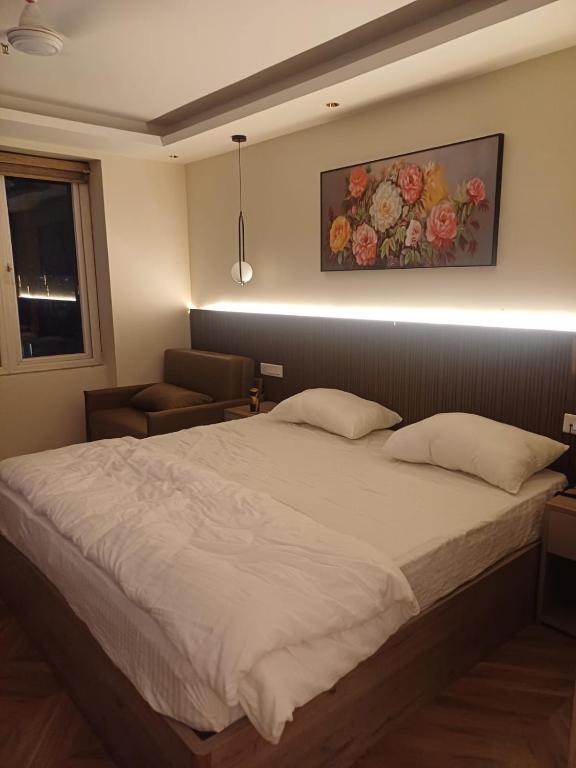 Ένα ή περισσότερα κρεβάτια σε δωμάτιο στο Studio apartment in Suntwilight near to expomart