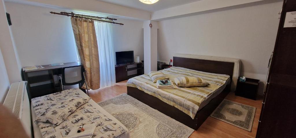 Postel nebo postele na pokoji v ubytování Lexington Apartments